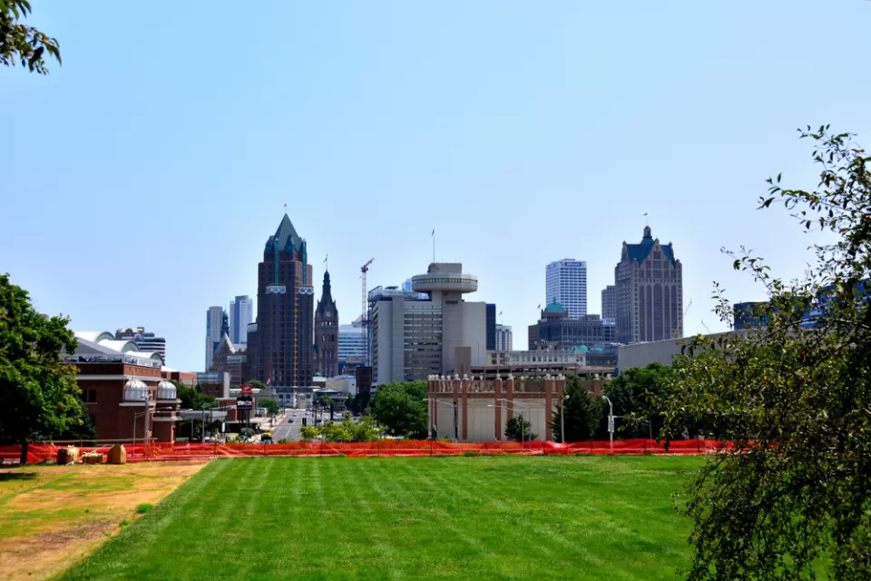 View of green grass lawn and downtown Milwaukee skyline